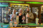 Image showing Amanda Solloway MP with Darley Abbey Distillery owner's Nichol and Andy